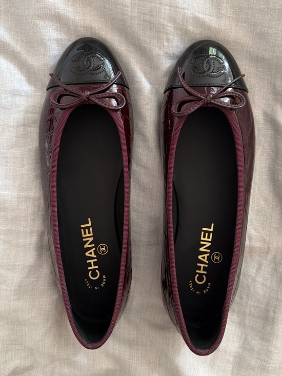 CHANEL Shoes - CHANEL Burgundy Patent and Black Cap Toe Ballet Flats